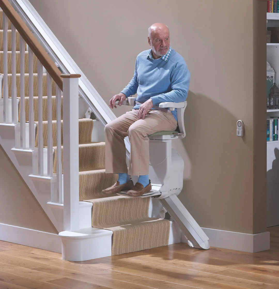 Stannah Siena straight stairlift neatly installed on a staircase in Edinburgh