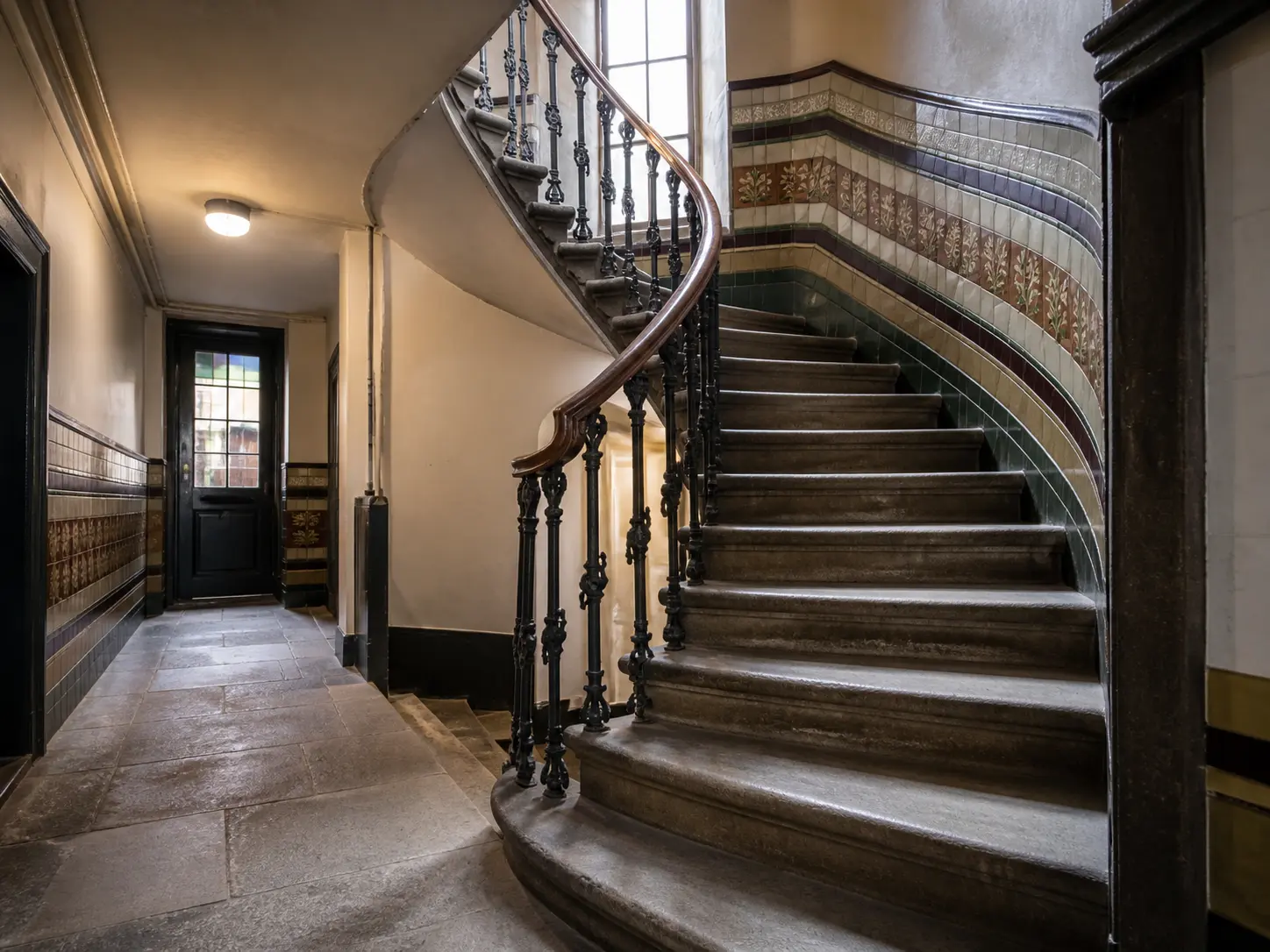 Traditional Scottish tenement close with stone staircase