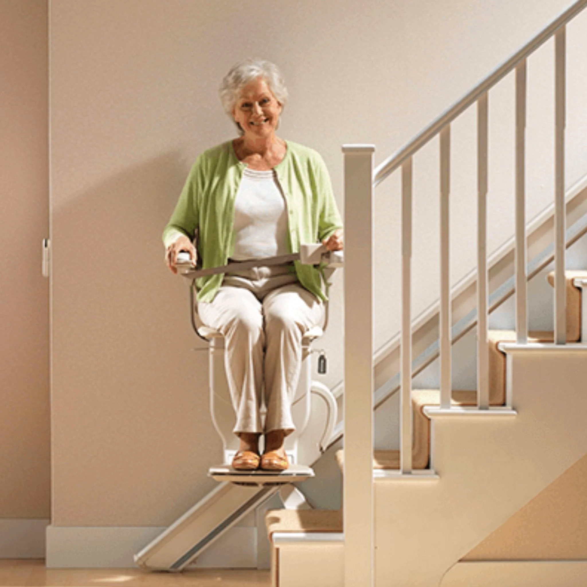 Modern stairlift installed on a staircase